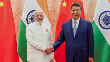 China and India vow to be “partners not rivals” as Modi and Xi meet in Tianjin.