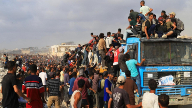At Least 20 Palestinians Killed as Aid Truck Overturns Near Nuseirat Camp
